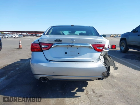 2016 Nissan Maxima SL z VIN 1N4AA6AP3GC377081, wystawiony jako IAAI lot #42235817 z przebiegiem 159 571 mil mil oraz . Historia ofert i sprzedaży dostępna na DreamBid. Obrazek 16.