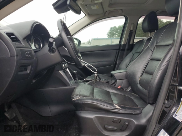2014 Mazda CX-5 Grand Touring with VIN JM3KE4DY5E0392571, listed as a Copart auction lot 51044335 with 141,334 mi miles and Clean Title. Bid and sale history available at carsss.com. Image 7.