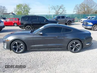 2019 Ford Mustang EcoBoost z VIN 1FA6P8TH9K5201378, wystawiony jako IAAI lot #41975711 z przebiegiem 46 945 mil mil oraz . Historia ofert i sprzedaży dostępna na DreamBid. Obrazek 14.
