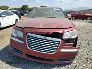 2014 Chrysler 300 C with VIN 2C3CCAKG2EH194526, listed as a Copart auction lot 70336734 with 144,892 mi miles and Salvage Title. Bid and sale history available at carsss.com. Image 5.