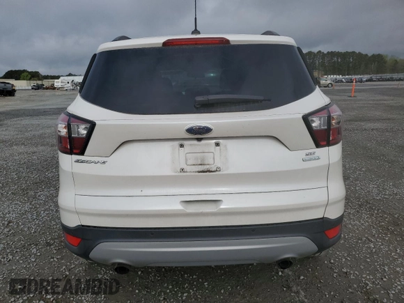 2017 Ford Escape SE with VIN 1FMCU0GD8HUD84748, listed as a Copart auction lot 51239865 with 111,561 mi miles and Salvage Title. Bid and sale history available at carsss.com. Image 6.