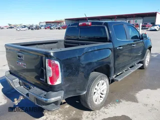 2016 GMC Canyon 2WD SLT with VIN 1GTG5DE35G1184141, listed as a IAAI auction lot 40875490 with 126,747 mi miles. Bid and sale history available at carsss.com. Image 4.