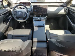 2024 Toyota bZ4X XLE с VIN JTMABACAXRA055247, выставлен на аукционе Copart как лот 52137665 с пробегом 11 294 миль миль и Списание • Salvage title. История ставок и продаж доступна на DreamBid. Изображение 8.