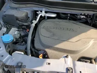 2023 Honda Passport TrailSport с VIN 5FNYF8H60PB032242, выставлен на аукционе Copart как лот 61903615 с пробегом 20 693 миль миль и Списание • Salvage title. История ставок и продаж доступна на DreamBid. Изображение 15.