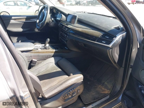 2016 BMW X5 eDrive xDrive40e with VIN 5UXKT0C50G0F75010, listed as a IAAI auction lot 41732410 with 88,671 mi miles. Bid and sale history available at carsss.com. Image 5.