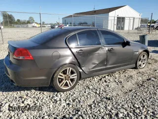 2009 Pontiac G8 with VIN 6G2ER57749L235662, listed as a Copart auction lot 73972344 with 146,384 mi miles and Salvage Title. Bid and sale history available at DreamBid. Image 3.