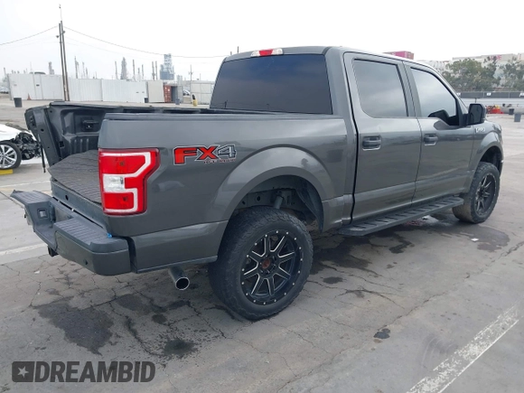 2018 Ford F-150 XL with VIN 1FTEW1EP4JKD45070, listed as a IAAI auction lot 42648874 with 140,424 mi miles and . Bid and sale history available at DreamBid. Image 4.