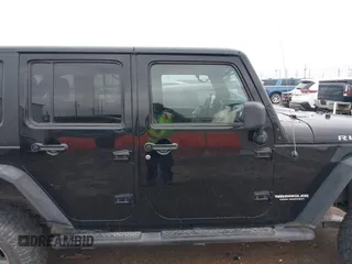 2012 Jeep Wrangler Unlimited Rubicon with VIN 1C4HJWFGXCL142804, listed as a IAAI auction lot 42183960 with 124,392 mi miles and . Bid and sale history available at DreamBid. Image 13.