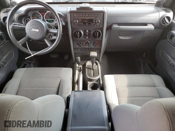 2007 Jeep Wrangler Unlimited Sahara with VIN 1J4GA59197L121262, listed as a Copart auction lot 61551685 with 233,309 mi miles and Clean title. Bid and sale history available at DreamBid. Image 8.