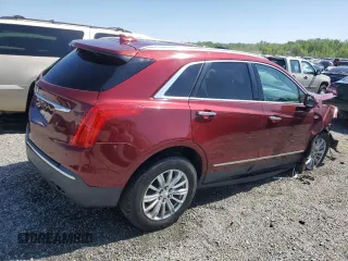 2018 Cadillac XT5 FWD with VIN 1GYKNARS1JZ205595, listed as a Copart auction lot 52428565 with 106,927 mi miles and Salvage title. Bid and sale history available at DreamBid. Image 3.