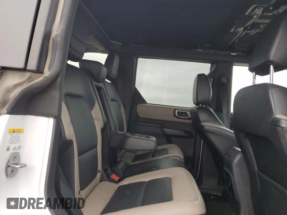 2024 Ford Bronco Wildtrak with VIN 1FMEE2BP9RLA07694, listed as a Copart auction lot 51856335 with 21,102 mi miles and Salvage title. Bid and sale history available at DreamBid. Image 12.