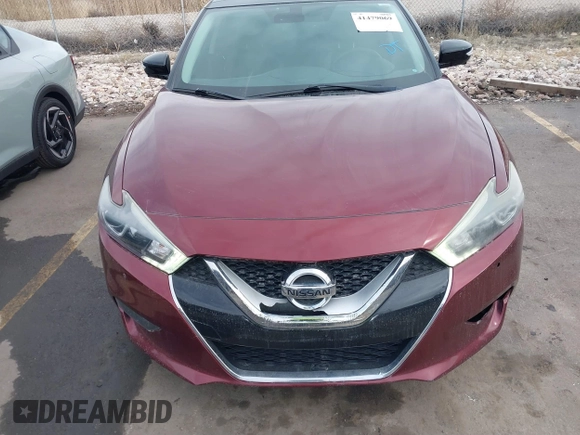 2016 Nissan Maxima SV with VIN 1N4AA6AP9GC410441, listed as a IAAI auction lot 41479069 with 74,252 mi miles and . Bid and sale history available at DreamBid. Image 12.