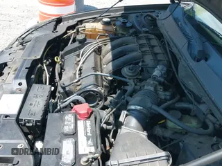 2003 Ford Taurus SEL Deluxe z VIN 1FAHP56S73A234807, wystawiony jako IAAI lot #42387929 z przebiegiem 226 619 mil mil oraz . Historia ofert i sprzedaży dostępna na DreamBid. Obrazek 12.