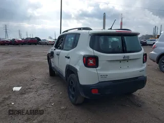 2015 Jeep Renegade Sport with VIN ZACCJBATXFPC42229, listed as a IAAI auction lot 40938824 with 136,649 mi miles and . Bid and sale history available at DreamBid. Image 3.