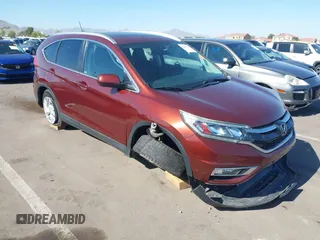 2015 Honda CR-V EX-L with VIN 2HKRM4H7XFH660871, listed as a IAAI auction lot 42095318 with 161,977 mi miles and . Bid and sale history available at carsss.com. Image 1.