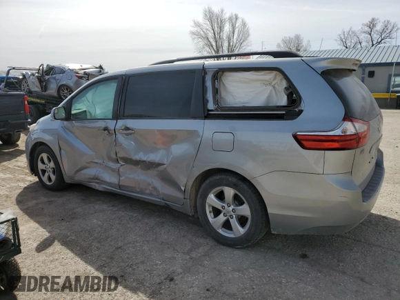 2015 Toyota Sienna LE AAS with VIN 5TDKK3DC7FS652662, listed as a Copart auction lot 49272325 with 129,652 mi miles and Salvage Title. Bid and sale history available at DreamBid. Image 2.