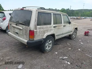 2001 Jeep Cherokee Sport with VIN 1J4FT48S21L516398, listed as a IAAI auction lot 42072391 with 187,730 mi miles. Bid and sale history available at carsss.com. Image 4.