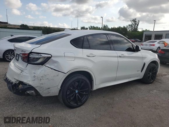 2019 BMW X6 xDrive35i with VIN 5UXKU2C5XK0Z64512, listed as a Copart auction lot 52157073 with 59,988 mi miles. Bid and sale history available at carsss.com. Image 3.