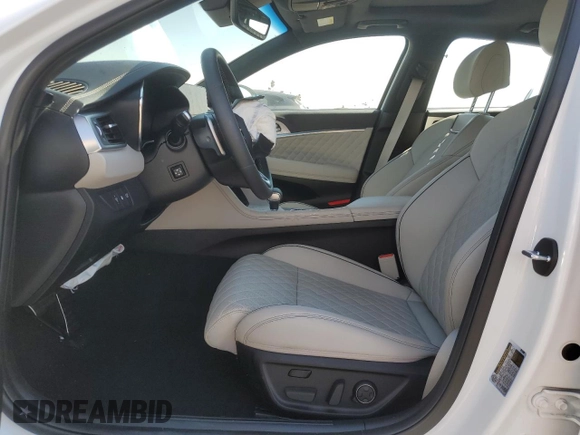 2023 Genesis G70 3.3T with VIN KMTG54TE3PU124511, listed as a Copart auction lot 74132184 with 2,534 mi miles and Salvage Title. Bid and sale history available at DreamBid. Image 7.