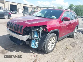 2016 Jeep Cherokee Latitude z VIN 1C4PJMCB9GW305472, wystawiony jako IAAI lot #42276395 z przebiegiem 112 621 mil mil oraz . Historia ofert i sprzedaży dostępna na DreamBid. Obrazek 2.