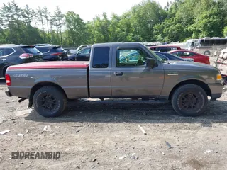 2010 Ford Ranger XLT z VIN 1FTLR4FE7APA02804, wystawiony jako IAAI lot #42500178 z przebiegiem 122 089 mil mil oraz . Historia ofert i sprzedaży dostępna na DreamBid. Obrazek 13.
