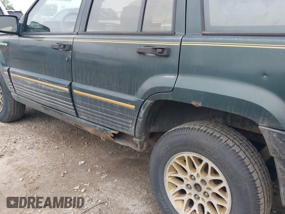 1993 Jeep Grand Cherokee Limited with VIN 1J4GZ78Y2PC540394, listed as a IAAI auction lot 42171655 with 94,417 mi miles and . Bid and sale history available at DreamBid. Image 14.