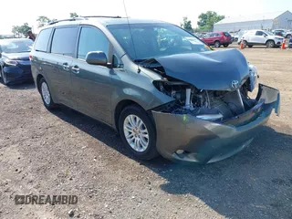 2014 Toyota Sienna XLE with VIN 5TDYK3DC6ES414892, listed as a IAAI auction lot 42545666 with 135,805 mi miles and . Bid and sale history available at DreamBid. Image 1.