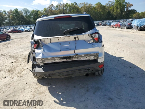 2017 Ford Escape SE with VIN 1FMCU0G96HUB44335, listed as a Copart auction lot 49849585 with 98,097 mi miles and Salvage Title. Bid and sale history available at carsss.com. Image 6.