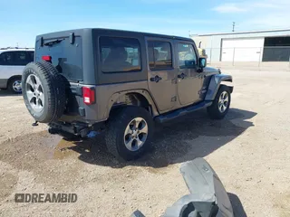 2017 Jeep Wrangler Unlimited Sahara with VIN 1C4BJWEG7HL641347, listed as a IAAI auction lot 41833356 with 84,735 mi miles. Bid and sale history available at carsss.com. Image 4.