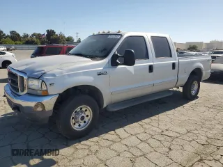 2002 Ford F-250 XL with VIN 1FTNW21L92ED10310, listed as a Copart auction lot 59132935 with 217,885 mi miles and Salvage title. Bid and sale history available at DreamBid. Image 1.