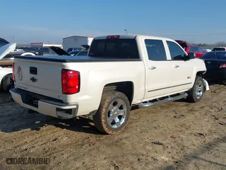 2015 Chevrolet Silverado 1500 LT with VIN 3GCUKREHXFG460818, listed as a IAAI auction lot 41491758 with 211,704 mi miles. Bid and sale history available at carsss.com. Image 4.