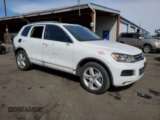 2012 Volkswagen Touareg с VIN WVGEG9BP1CD007581, выставлен на аукционе Copart как лот 47958355 с пробегом 79 649 миль миль и Списание • Salvage title. История ставок и продаж доступна на DreamBid. Изображение 4.