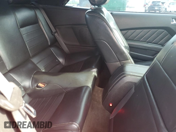 2013 Ford Mustang V6 with VIN 1ZVBP8EM0D5265005, listed as a Copart auction lot 54985425 with 128,964 mi miles and Salvage title. Bid and sale history available at DreamBid. Image 10.