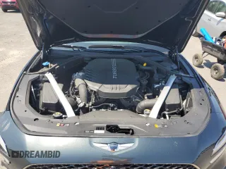 2023 Genesis G70 3.3T with VIN KMTG54TE3PU117672, listed as a Copart auction lot 63418684 with 19,899 mi miles and Salvage Title. Bid and sale history available at carsss.com. Image 12.