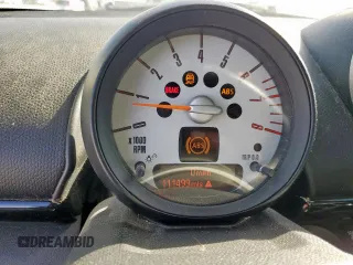 2012 MINI Countryman S with VIN WMWZC3C5XCWM27675, listed as a Copart auction lot 49676205 with 111,499 mi miles and Salvage title. Bid and sale history available at DreamBid. Image 9.