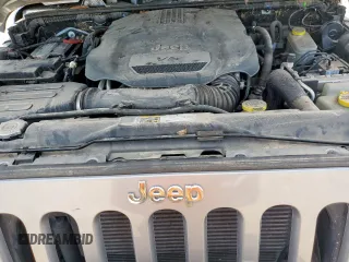 2015 Jeep Wrangler Unlimited Rubicon z VIN 1C4BJWFG0FL529310, wystawiony jako Copart lot #64337405 z przebiegiem Nie podano mil oraz Szkoda całkowita • Salvage title. Historia ofert i sprzedaży dostępna na DreamBid. Obrazek 11.