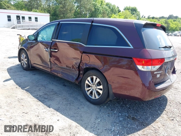 2014 Honda Odyssey EX-L z VIN 5FNRL5H64EB076088, wystawiony jako IAAI lot #42144781 z przebiegiem 174 135 mil mil oraz . Historia ofert i sprzedaży dostępna na DreamBid. Obrazek 3.