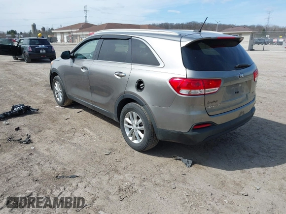 2017 Kia Sorento LX with VIN 5XYPG4A3XHG297598, listed as a IAAI auction lot 42029607 with 104,157 mi miles. Bid and sale history available at carsss.com. Image 3.