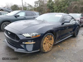 2021 Ford Mustang GT with VIN 1FA6P8CFXM5106832, listed as a IAAI auction lot 41512413 with 22,171 mi miles. Bid and sale history available at carsss.com. Image 2.