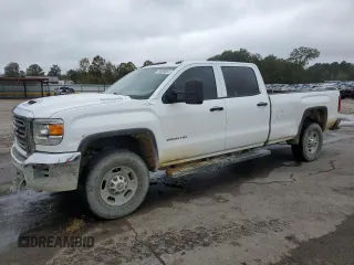 2018 GMC Sierra 2500HD z VIN 1GT12REY5JF202154, wystawiony jako Copart lot #79009504 z przebiegiem 248 716 mil mil oraz Czysty tytuł • Clean title. Historia ofert i sprzedaży dostępna na DreamBid. Obrazek 1.