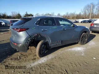2023 Mazda CX-30 S Carbon Edition with VIN 3MVDMBCM9PM545538, listed as a Copart auction lot 86072184 with 29,395 mi miles and Salvage Title. Bid and sale history available at DreamBid. Image 3.