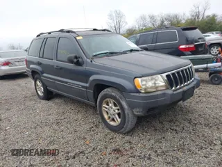 2003 Jeep Grand Cherokee Laredo with VIN 1J4GX48SX3C604904, listed as a IAAI auction lot 40884443 with 188,352 mi miles. Bid and sale history available at carsss.com. Image 1.