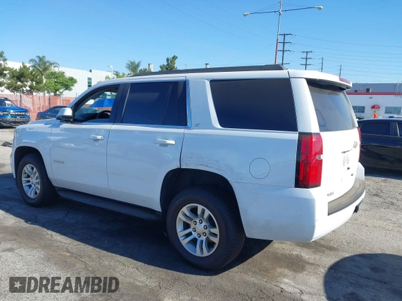 2020 Chevrolet Tahoe LT with VIN 1GNSCBKC0LR195687, listed as a IAAI auction lot 42620344 with 48,059 mi miles and . Bid and sale history available at DreamBid. Image 3.