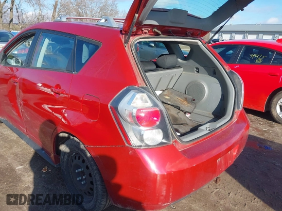 2009 Pontiac Vibe with VIN 5Y2SM670X9Z402770, listed as a IAAI auction lot 41200223 with 174,891 mi miles. Bid and sale history available at carsss.com. Image 3.
