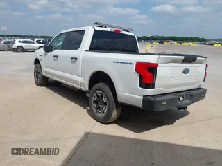 2023 Ford F-150 Lightning Pro with VIN 1FTVW1EL2PWG18764, listed as a IAAI auction lot 41908278 with 16,276 mi miles and . Bid and sale history available at DreamBid. Image 3.