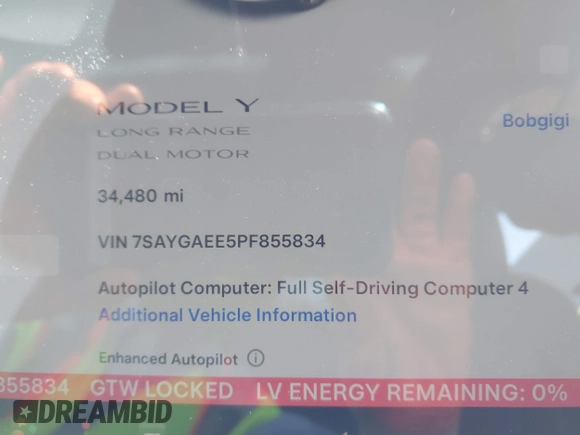 2023 Tesla Model Y Long Range with VIN 7SAYGAEE5PF855834, listed as a IAAI auction lot 41943491 with 34,480 mi miles. Bid and sale history available at carsss.com. Image 7.