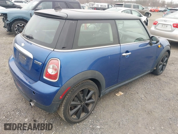 2013 MINI Hardtop with VIN WMWSU3C54DT375008, listed as a IAAI auction lot 41751594 with 136,269 mi miles and . Bid and sale history available at DreamBid. Image 4.