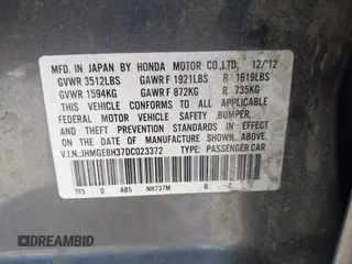 2013 Honda Fit with VIN JHMGE8H37DC023372, listed as a IAAI auction lot 40006280 with 117,791 mi miles. Bid and sale history available at carsss.com. Image 9.