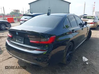 2021 BMW 3 Series M340i xDrive with VIN 3MW5U9J0XM8B53474, listed as a IAAI auction lot 39952984 with 55,938 mi miles. Bid and sale history available at carsss.com. Image 4.