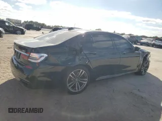 2017 BMW 7 Series 740i with VIN WBA7E2C51HG739462, listed as a Copart auction lot 84157364 with 137,881 mi miles and Salvage Title. Bid and sale history available at carsss.com. Image 3.